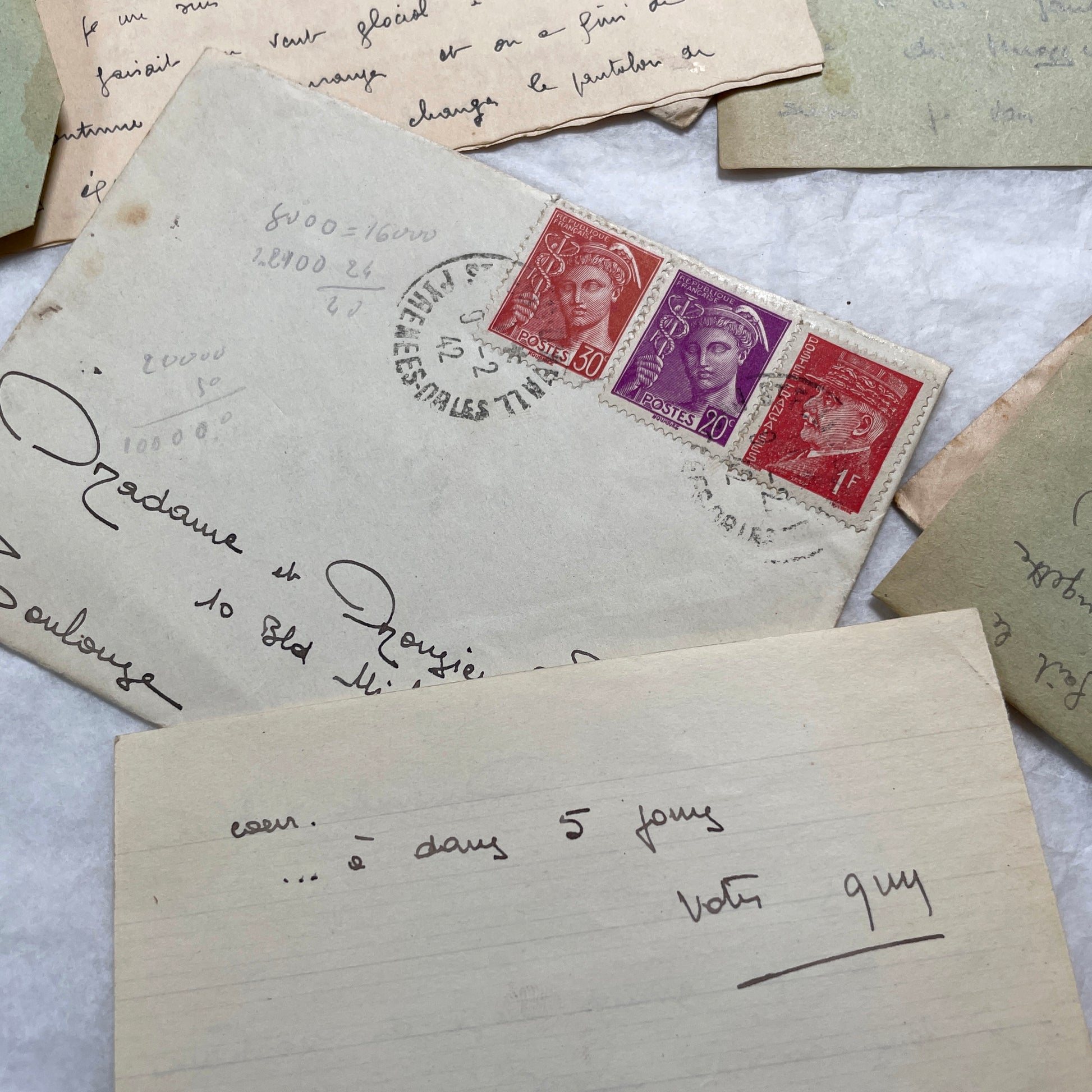 Five French handwritten letters and envelopes from the 1940s, featuring period postage stamps and script.