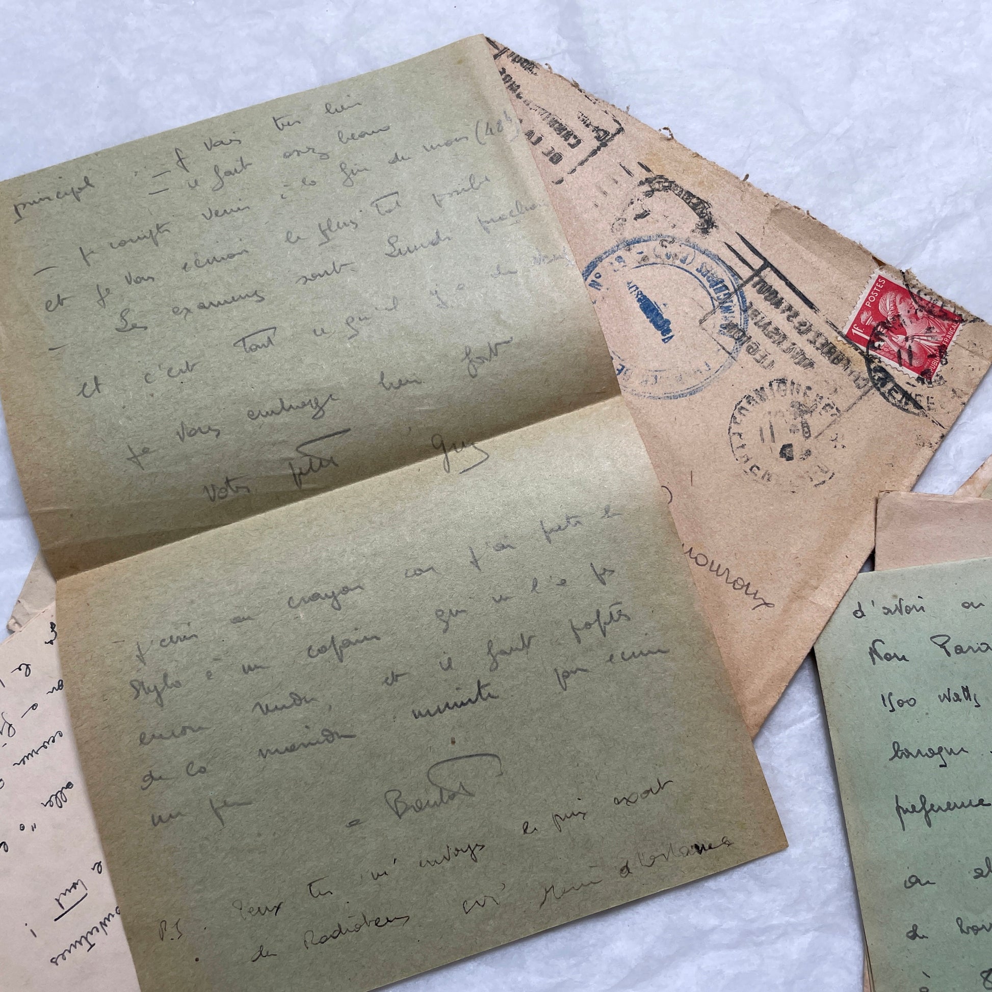 Five French handwritten letters and envelopes from the 1940s, featuring period postage stamps and script.