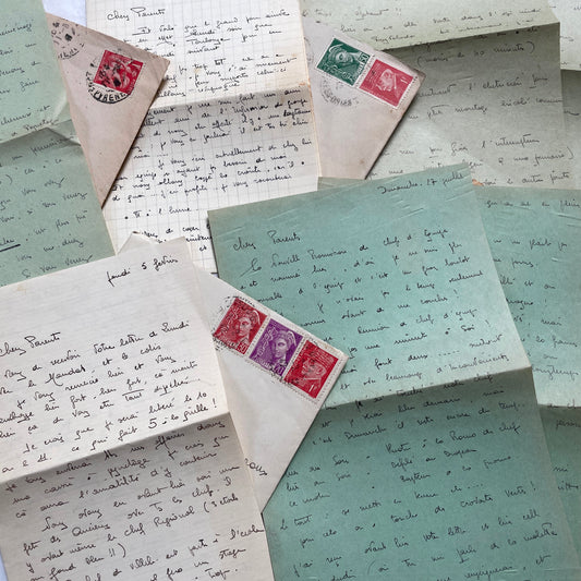 Lot of 1940s French handwritten letters and envelopes with vintage stamps on varied paper. Historical correspondence.