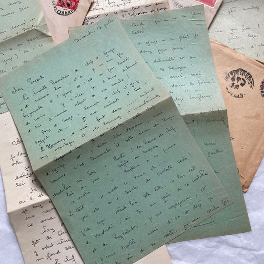 Lot of 1940s French handwritten letters and envelopes with vintage stamps on varied paper. Historical correspondence.
