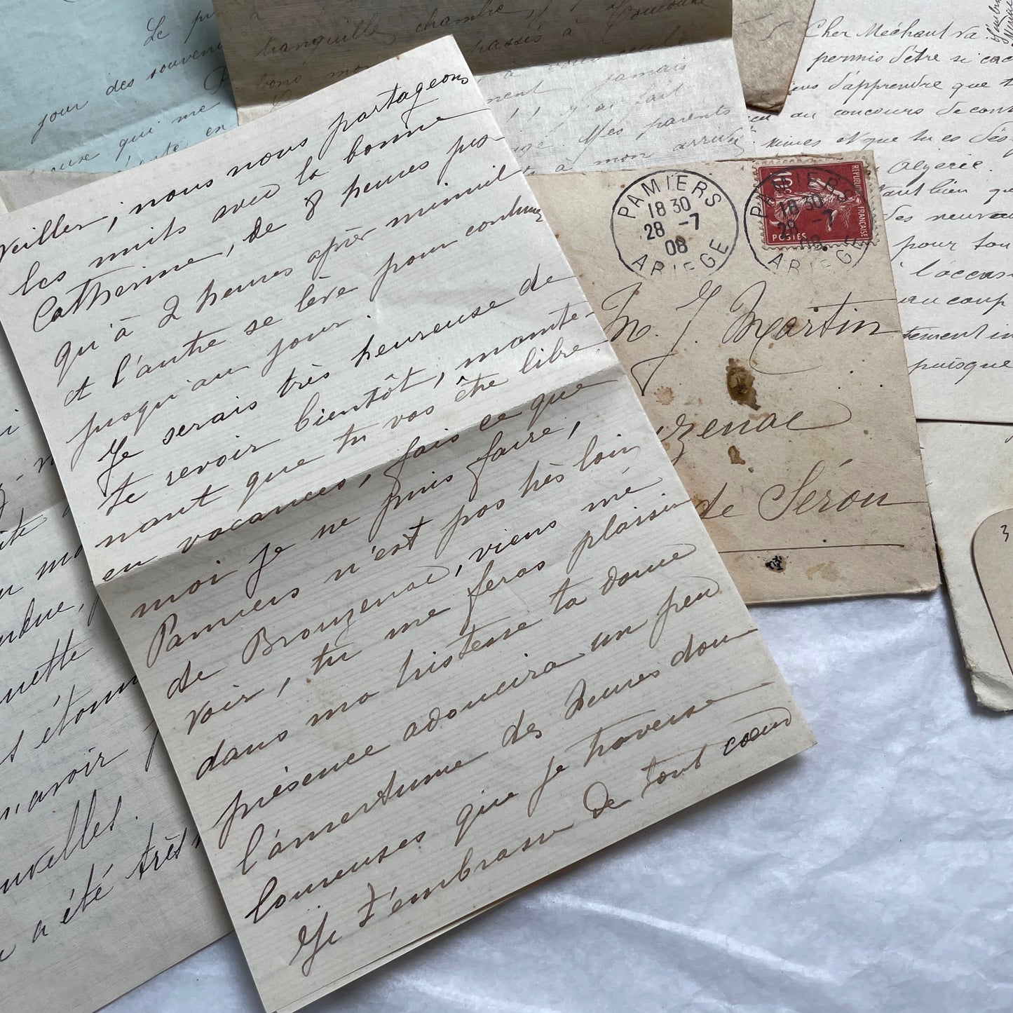 Set of 5 original French letters and envelopes from the 1900s, featuring handwritten text and historical postal stamps.
