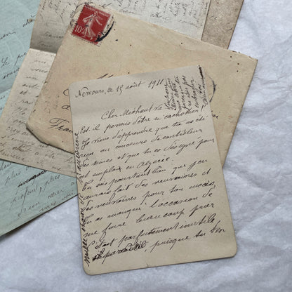 Set of 5 original French letters and envelopes from the 1900s, featuring handwritten text and historical postal stamps.