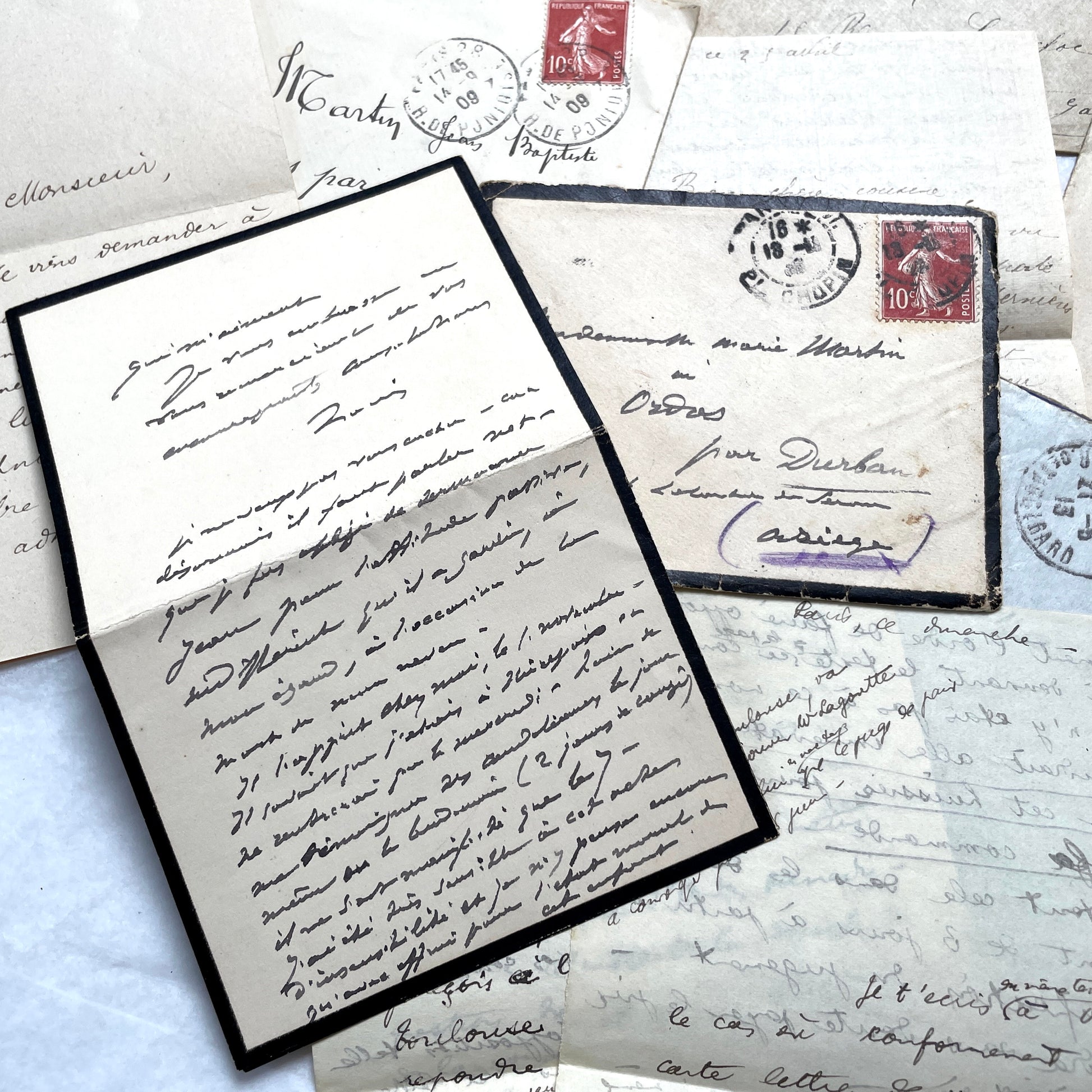 1900s French letters and envelopes set with handwritten correspondence and vintage stamps.