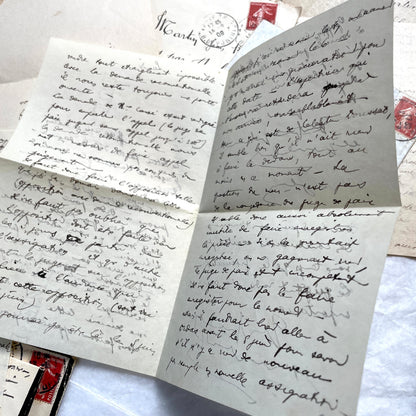 1900s French letters and envelopes set with handwritten correspondence and vintage stamps.