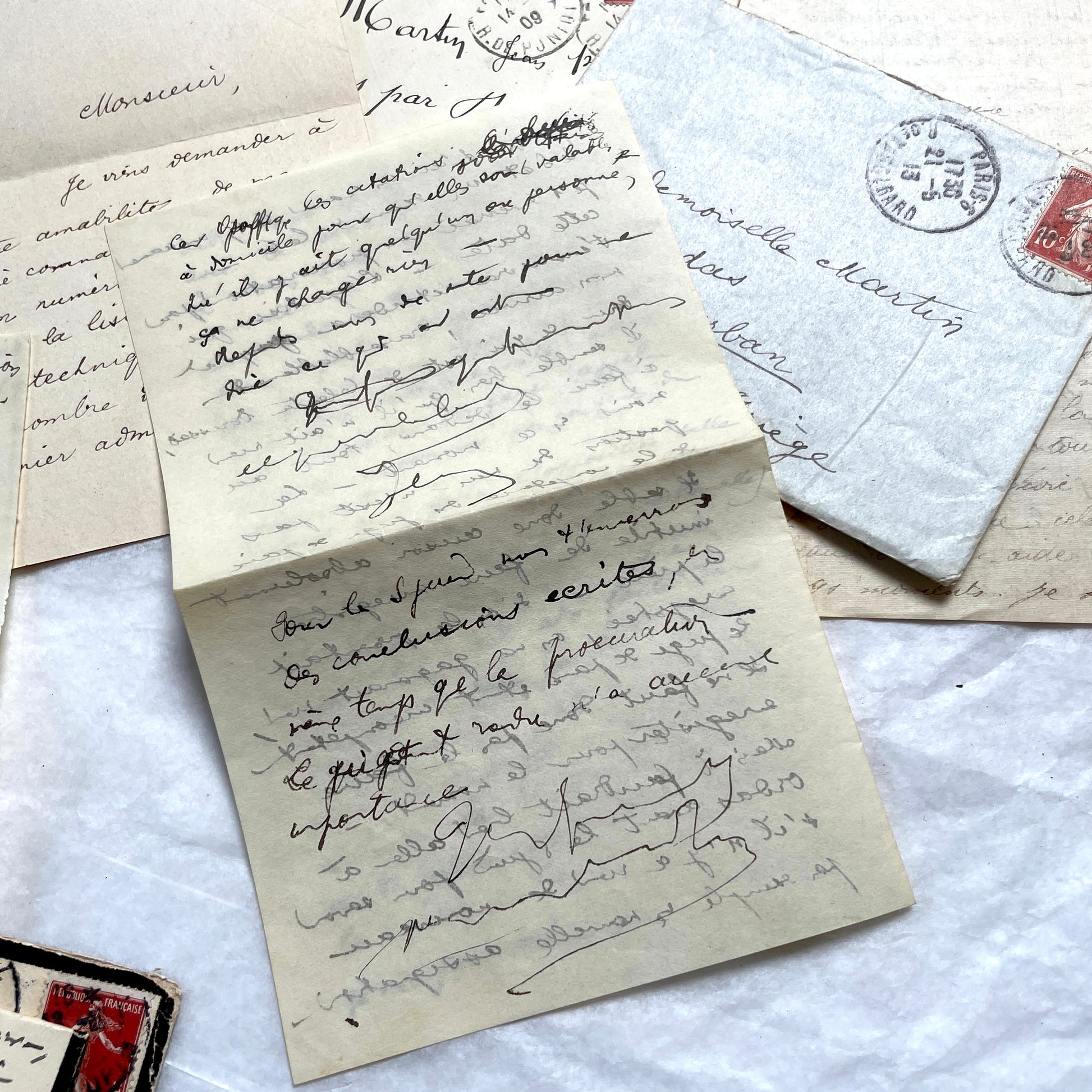 1900s French letters and envelopes set with handwritten correspondence and vintage stamps.