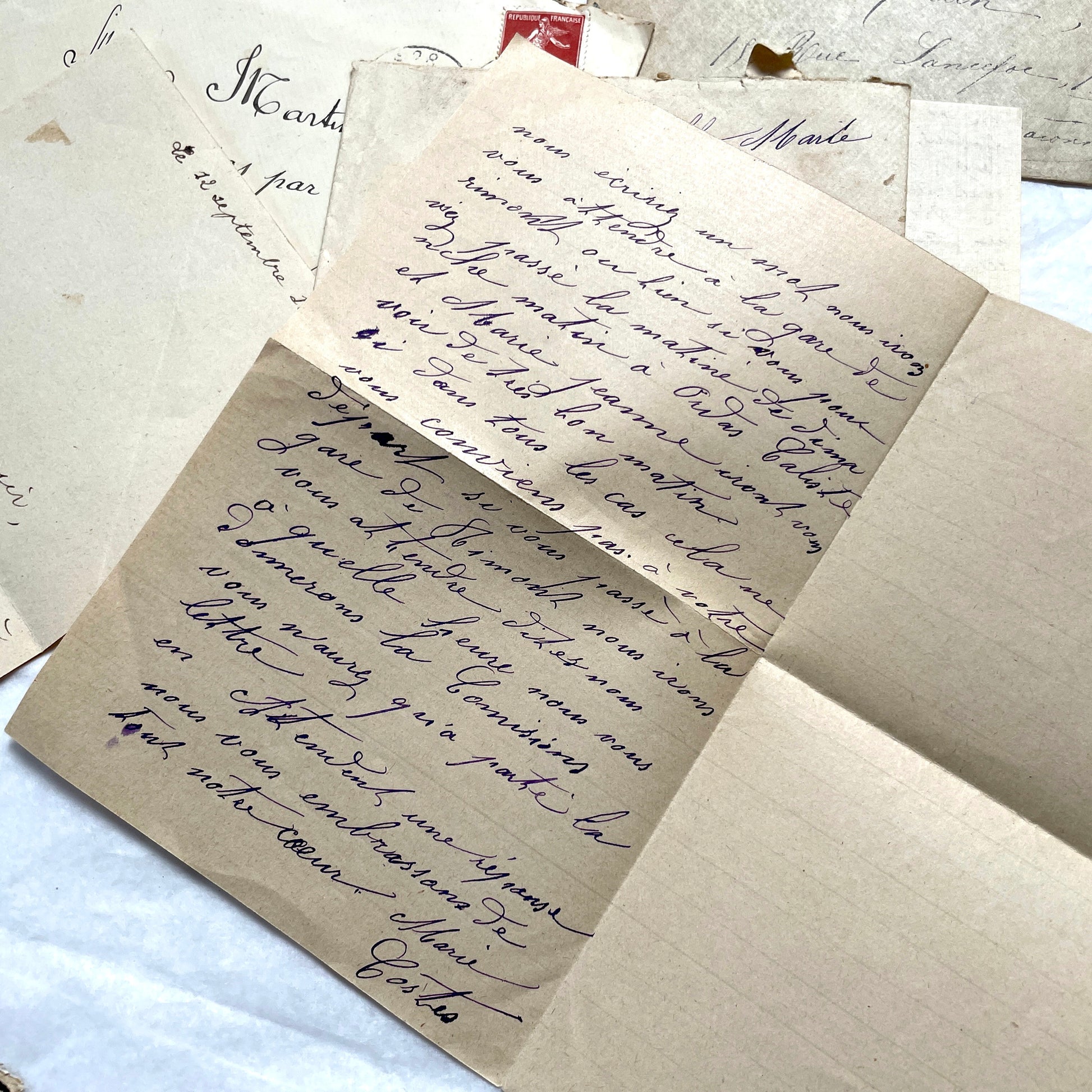 1900s French letters and envelopes set with handwritten correspondence and vintage stamps.
