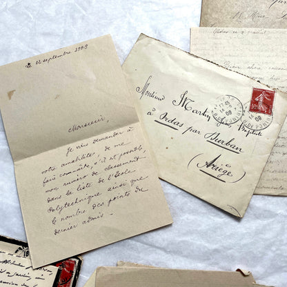 1900s French letters and envelopes set with handwritten correspondence and vintage stamps.