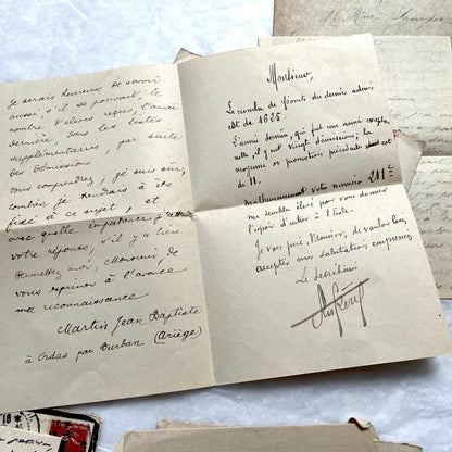 1900s French letters and envelopes set with handwritten correspondence and vintage stamps.