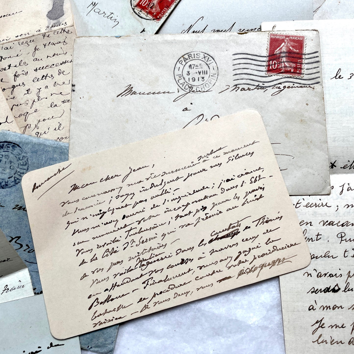 1910s vintage French letters and envelopes lot, featuring handwritten script, antique stamps, and historical postmarks.