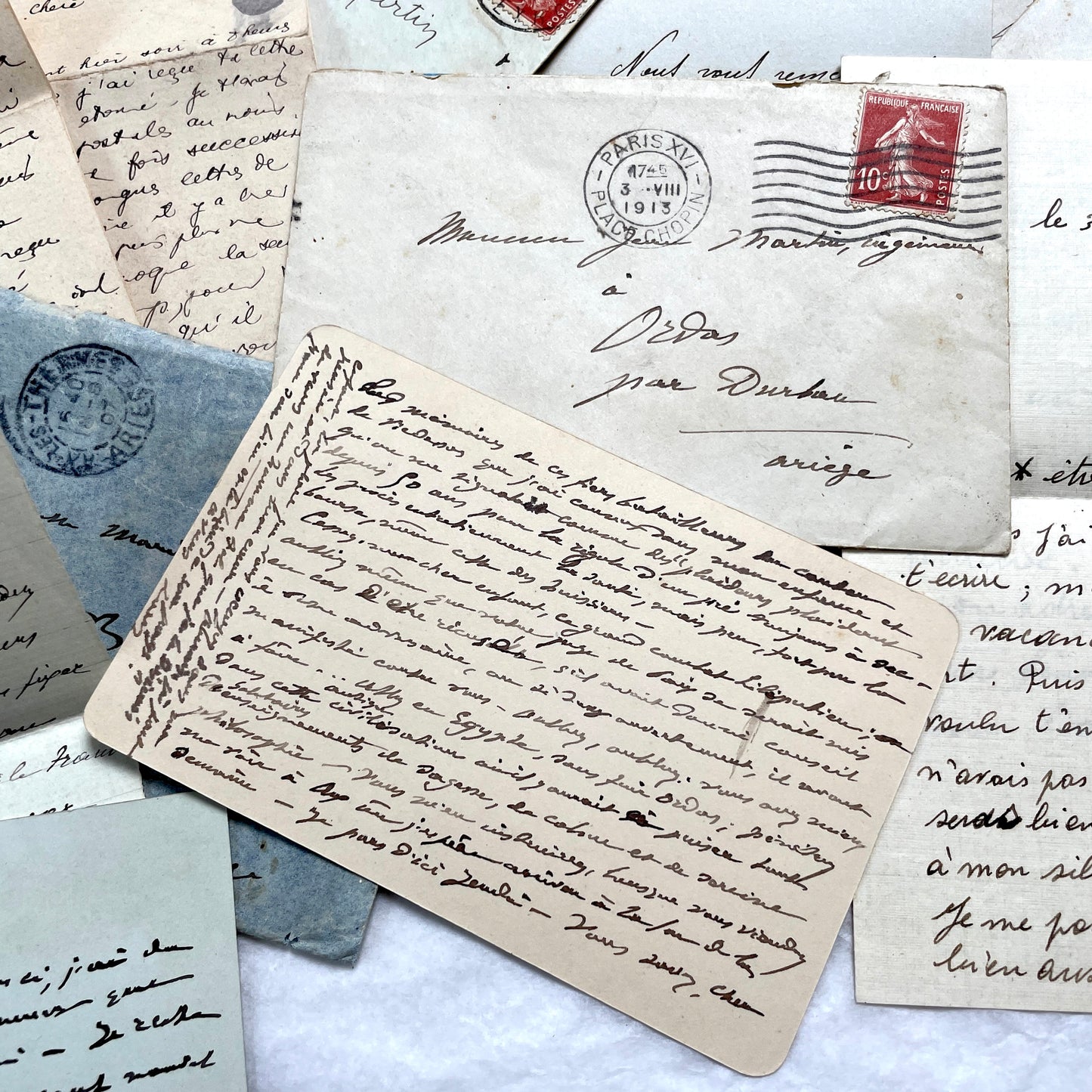 1910s vintage French letters and envelopes lot, featuring handwritten script, antique stamps, and historical postmarks.