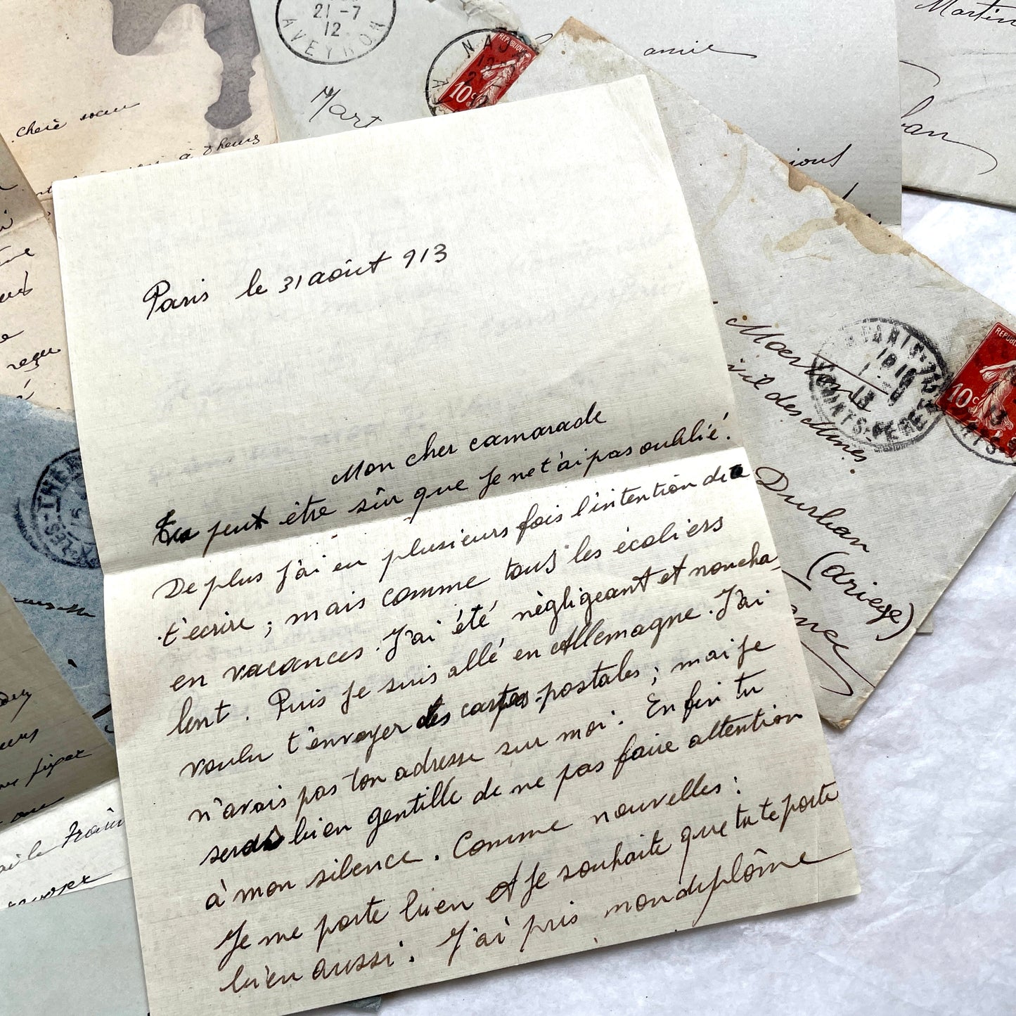 1910s vintage French letters and envelopes lot, featuring handwritten script, antique stamps, and historical postmarks.