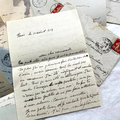 1910s vintage French letters and envelopes lot, featuring handwritten script, antique stamps, and historical postmarks.
