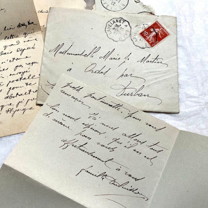 1910s vintage French letters and envelopes lot, featuring handwritten script, antique stamps, and historical postmarks.