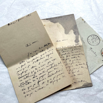 1910s vintage French letters and envelopes lot, featuring handwritten script, antique stamps, and historical postmarks.