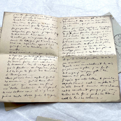 1910s vintage French letters and envelopes lot, featuring handwritten script, antique stamps, and historical postmarks.