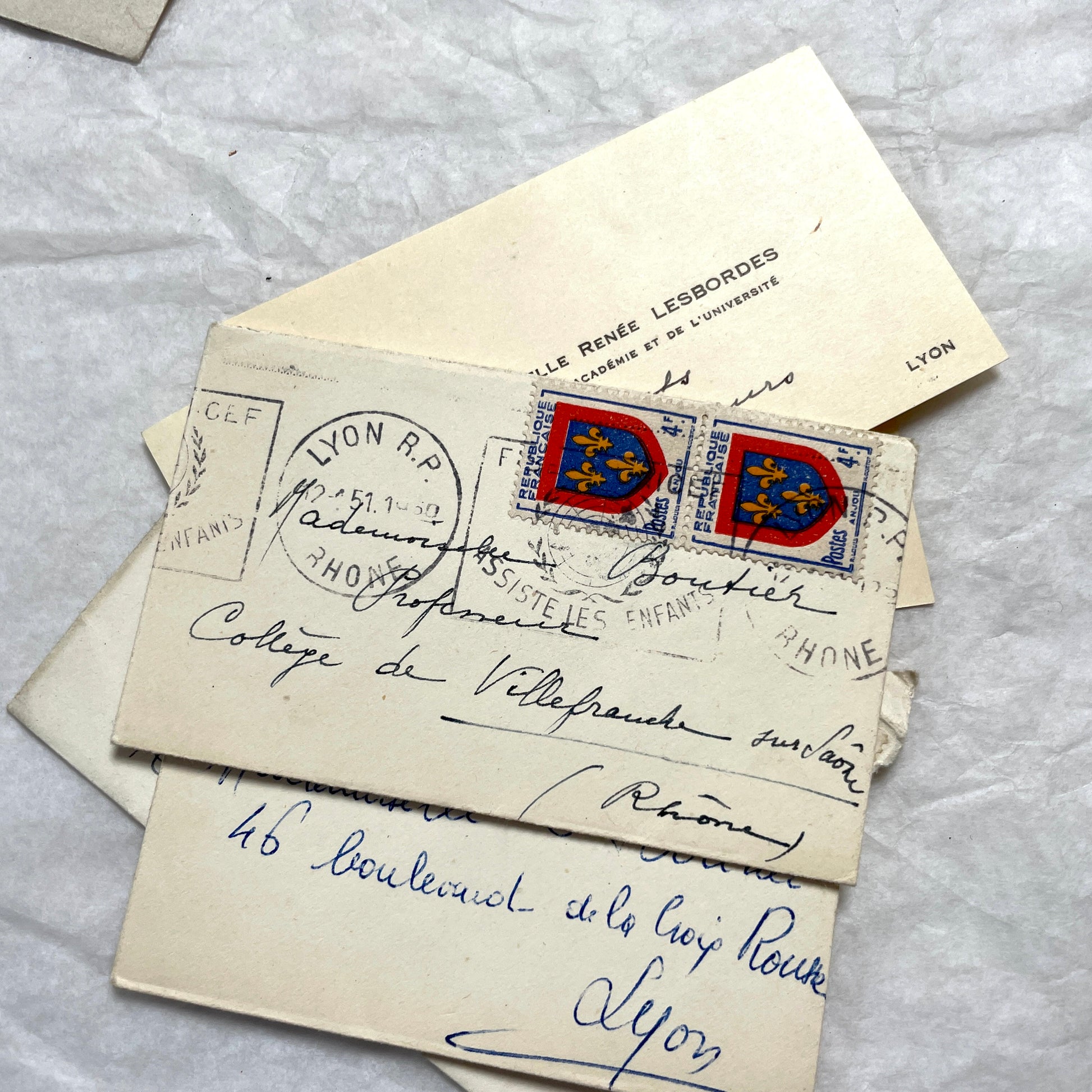 Lot of 10 1950s French ephemera small envelopes with handwritten notes, stamps, and postmarks.