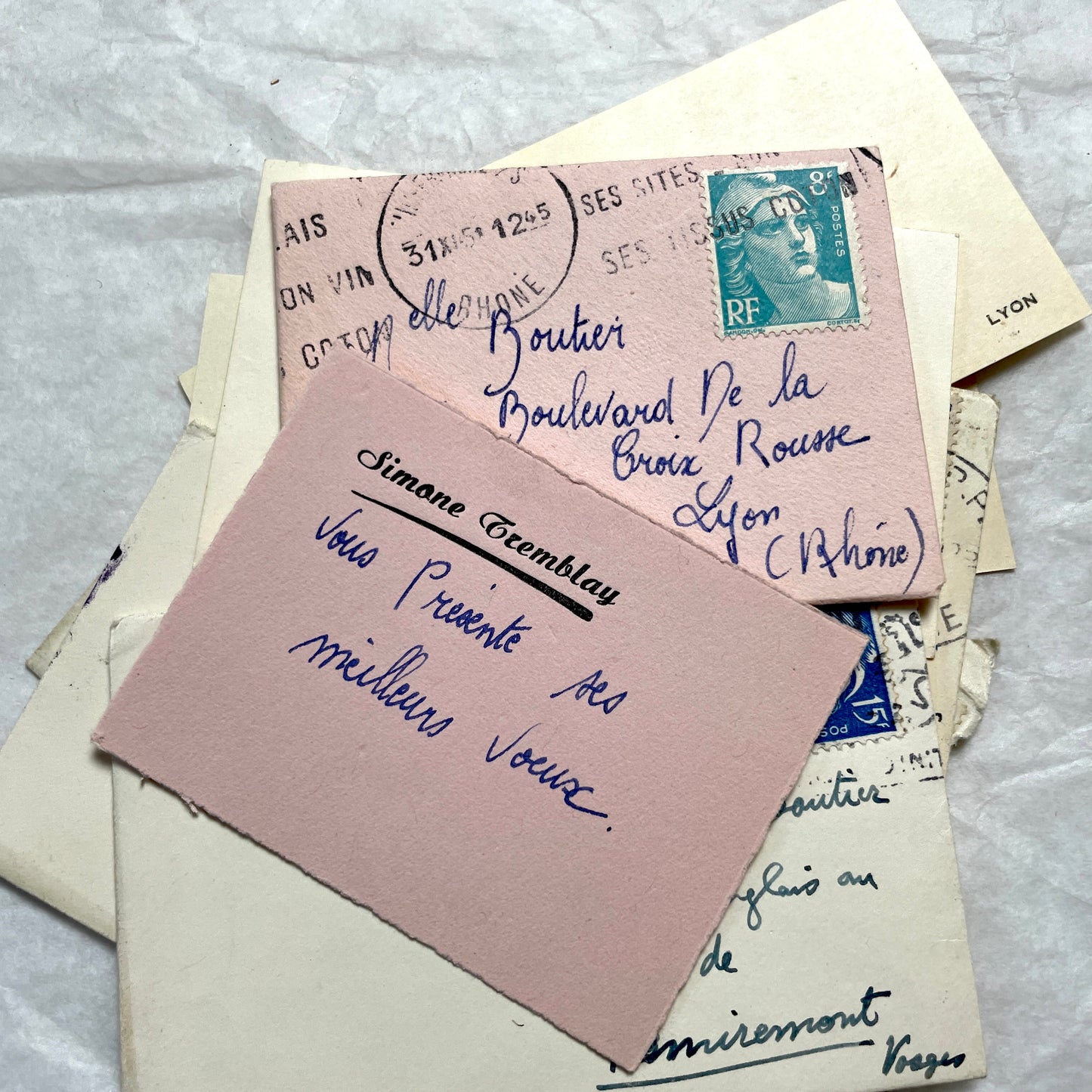 Lot of 10 1950s French ephemera small envelopes with handwritten notes, stamps, and postmarks.