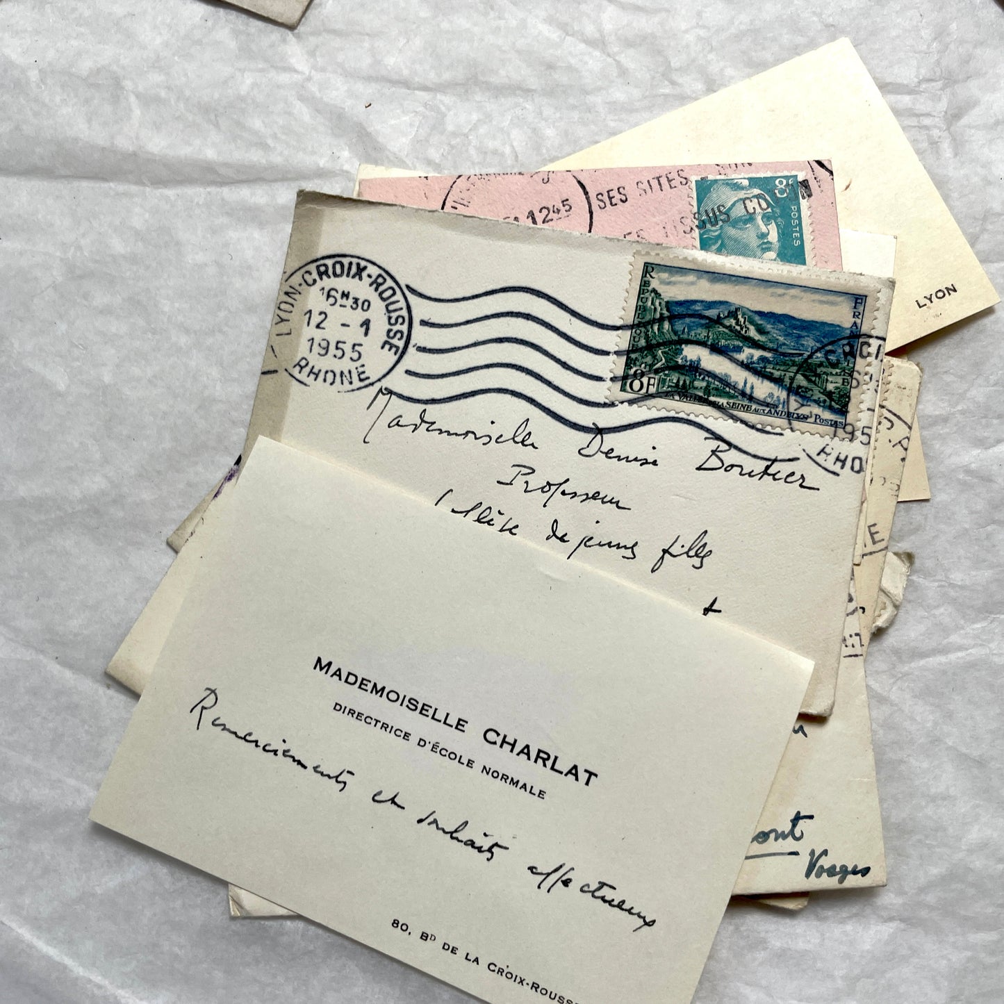 Lot of 10 1950s French ephemera small envelopes with handwritten notes, stamps, and postmarks.