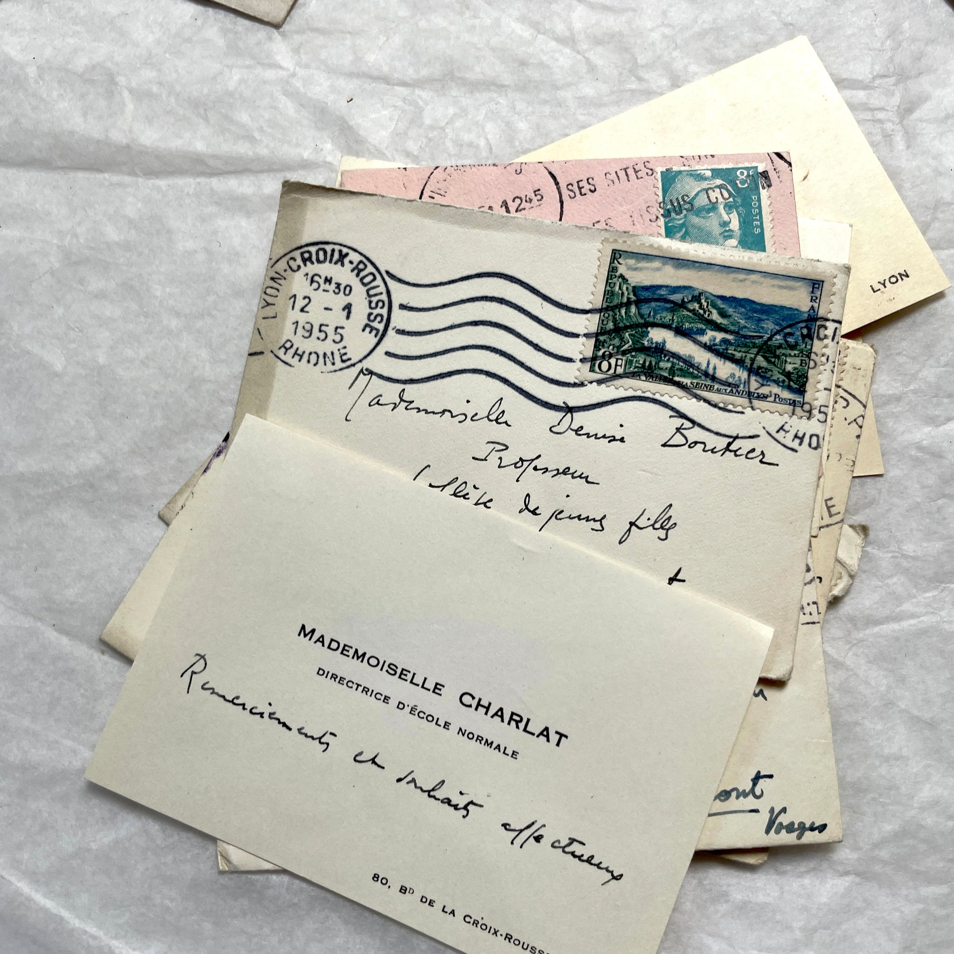 Lot of 10 1950s French ephemera small envelopes with handwritten notes, stamps, and postmarks.