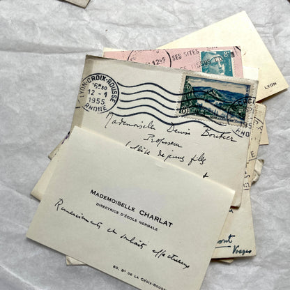 Lot of 10 1950s French ephemera small envelopes with handwritten notes, stamps, and postmarks.
