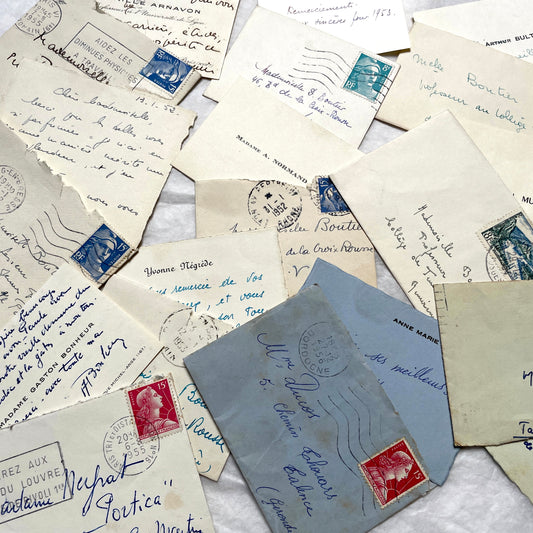 1950s vintage French envelopes lot with handwritten notes, old stamps, and historical postmarks from France.