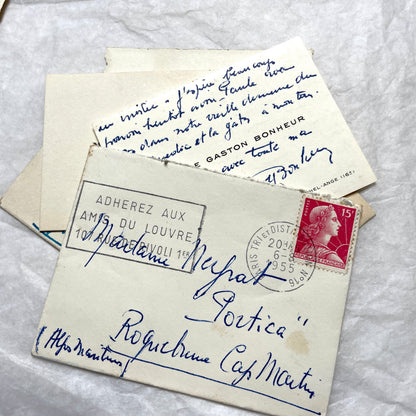 1950s vintage French envelopes lot with handwritten notes, old stamps, and historical postmarks from France.