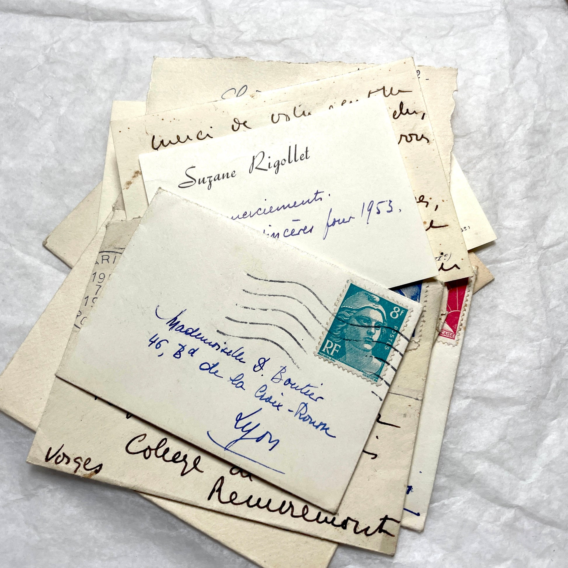 1950s vintage French envelopes lot with handwritten notes, old stamps, and historical postmarks from France.
