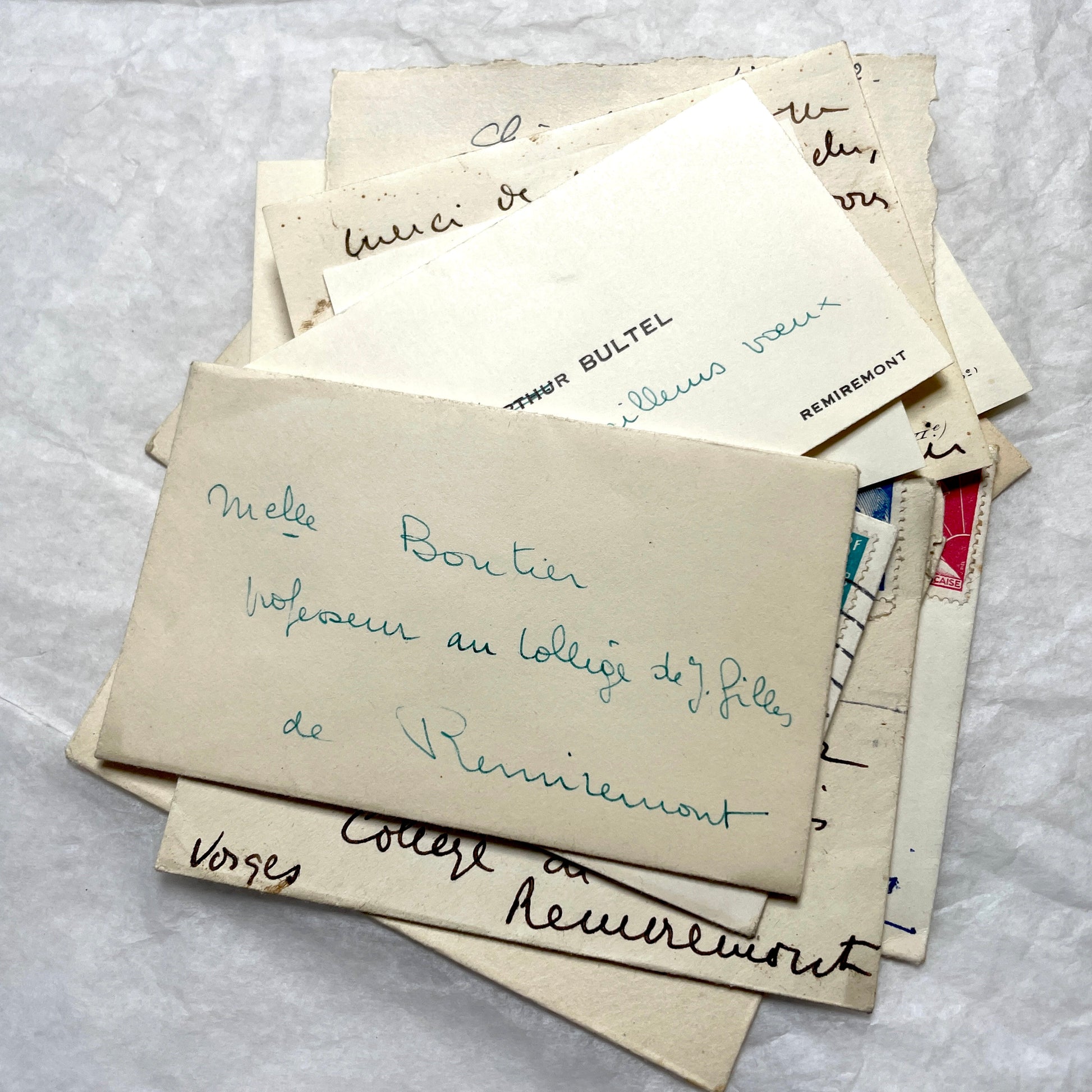 1950s vintage French envelopes lot with handwritten notes, old stamps, and historical postmarks from France.