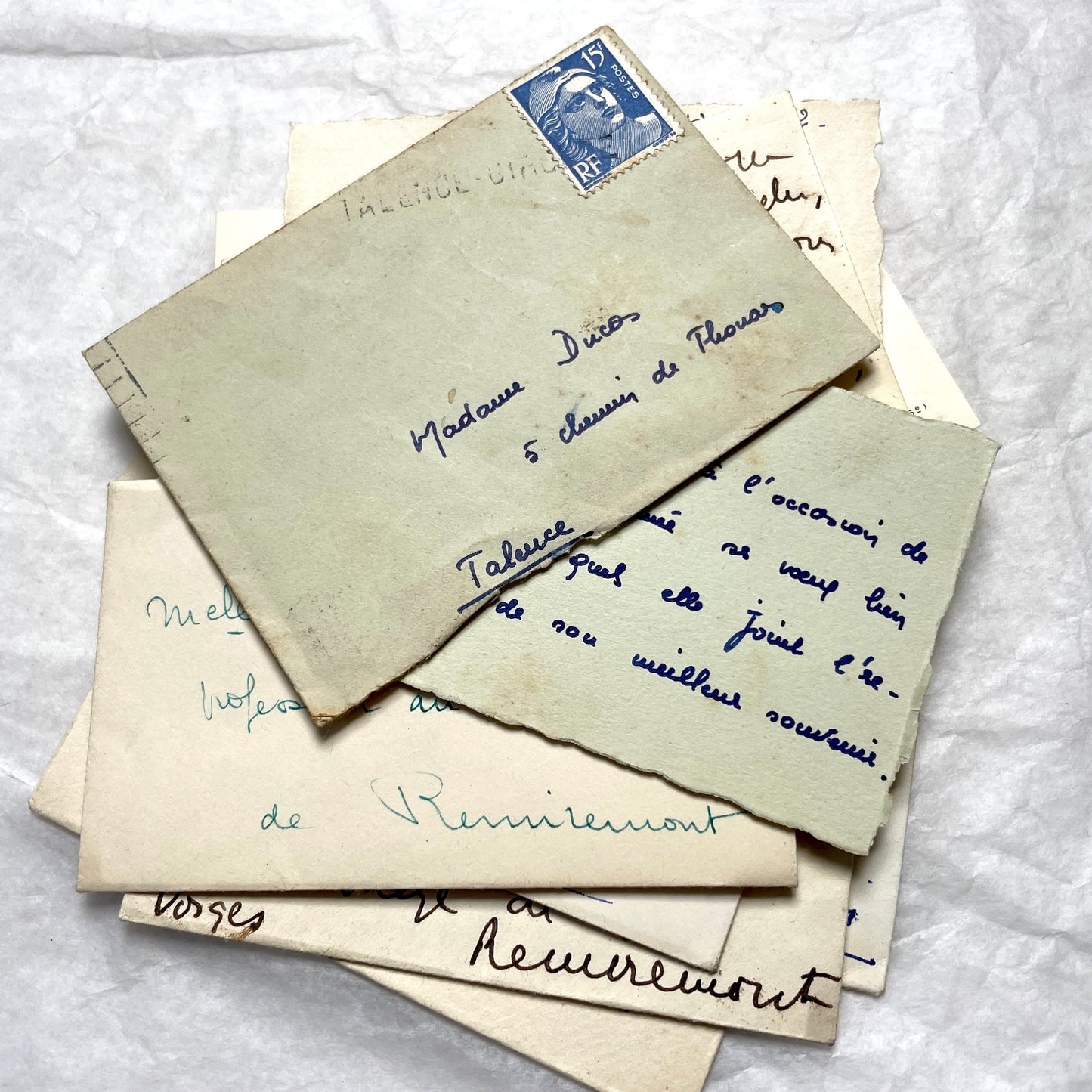 1950s vintage French envelopes lot with handwritten notes, old stamps, and historical postmarks from France.