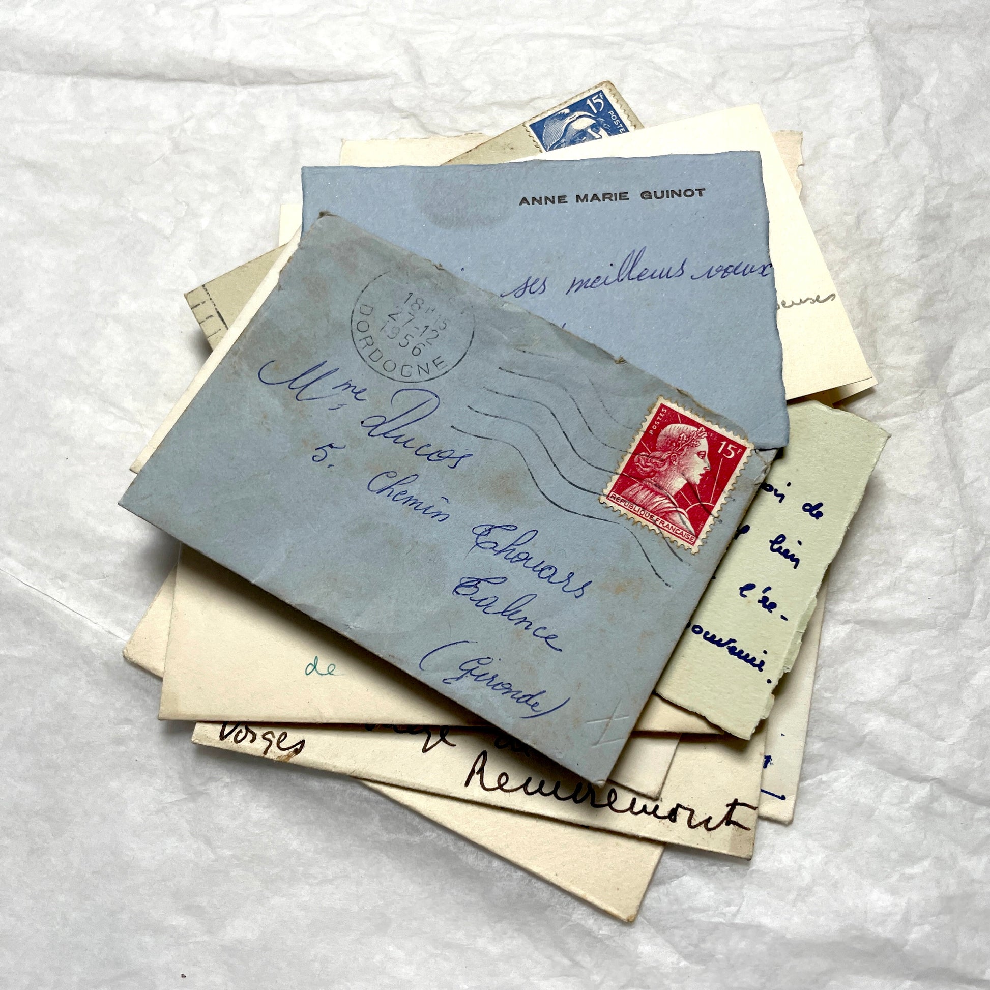 1950s vintage French envelopes lot with handwritten notes, old stamps, and historical postmarks from France.