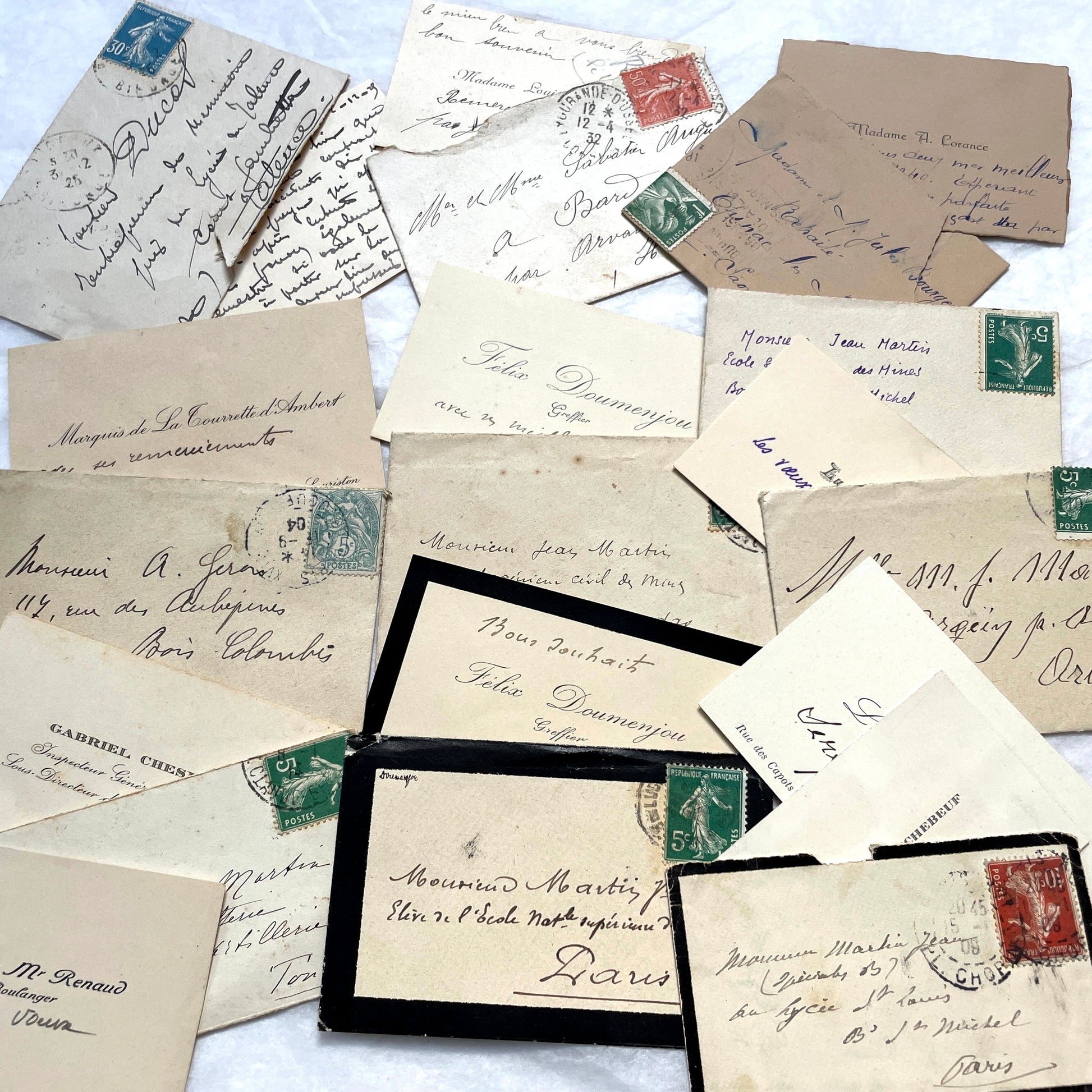 1930s French envelopes and handwritten notes lot, featuring vintage stamps and antique calligraphy addresses.