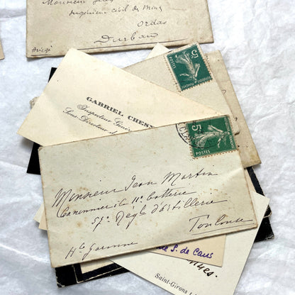 1930s French envelopes and handwritten notes lot, featuring vintage stamps and antique calligraphy addresses.