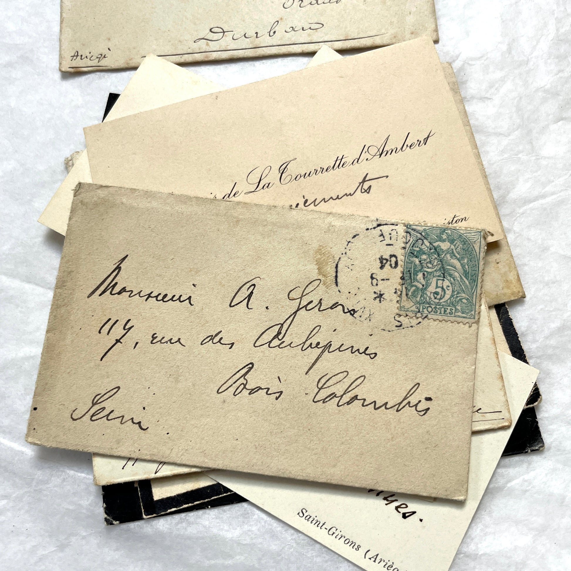 1930s French envelopes and handwritten notes lot, featuring vintage stamps and antique calligraphy addresses.