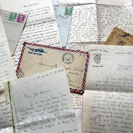 1950s French letters set with original envelopes, handwritten text, vintage stamps, and airmail markings.