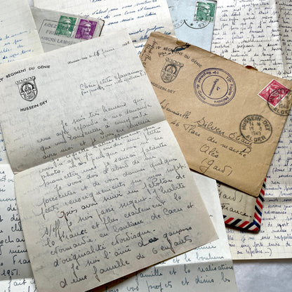 1950s French letters set with original envelopes, handwritten text, vintage stamps, and airmail markings.