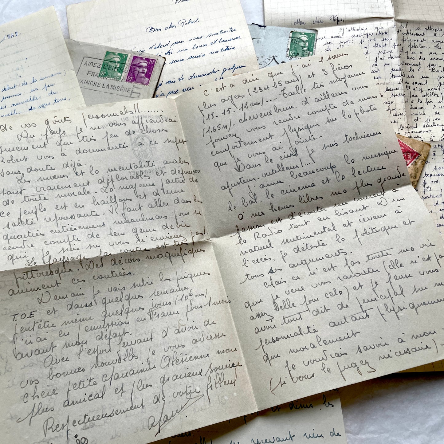 1950s French letters set with original envelopes, handwritten text, vintage stamps, and airmail markings.