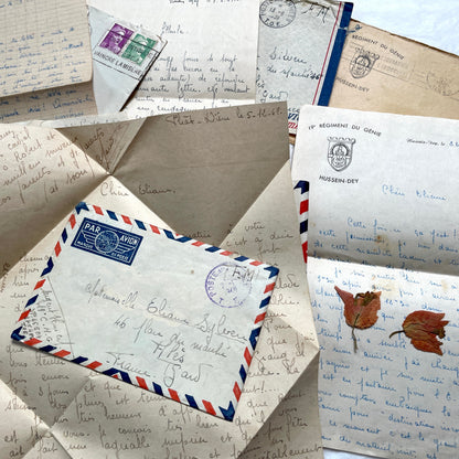 Set of 1940s French letters and envelopes, featuring handwritten notes, postal stamps, and vintage airmail details.