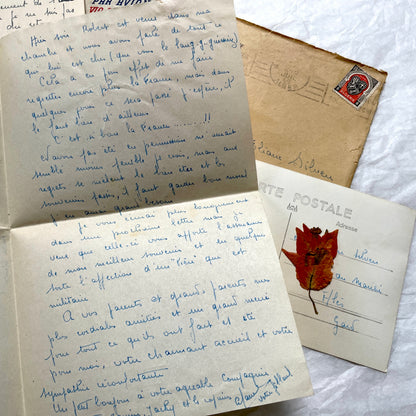 Set of 1940s French letters and envelopes, featuring handwritten notes, postal stamps, and vintage airmail details.