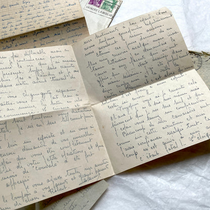 Set of 1940s French letters and envelopes, featuring handwritten notes, postal stamps, and vintage airmail details.