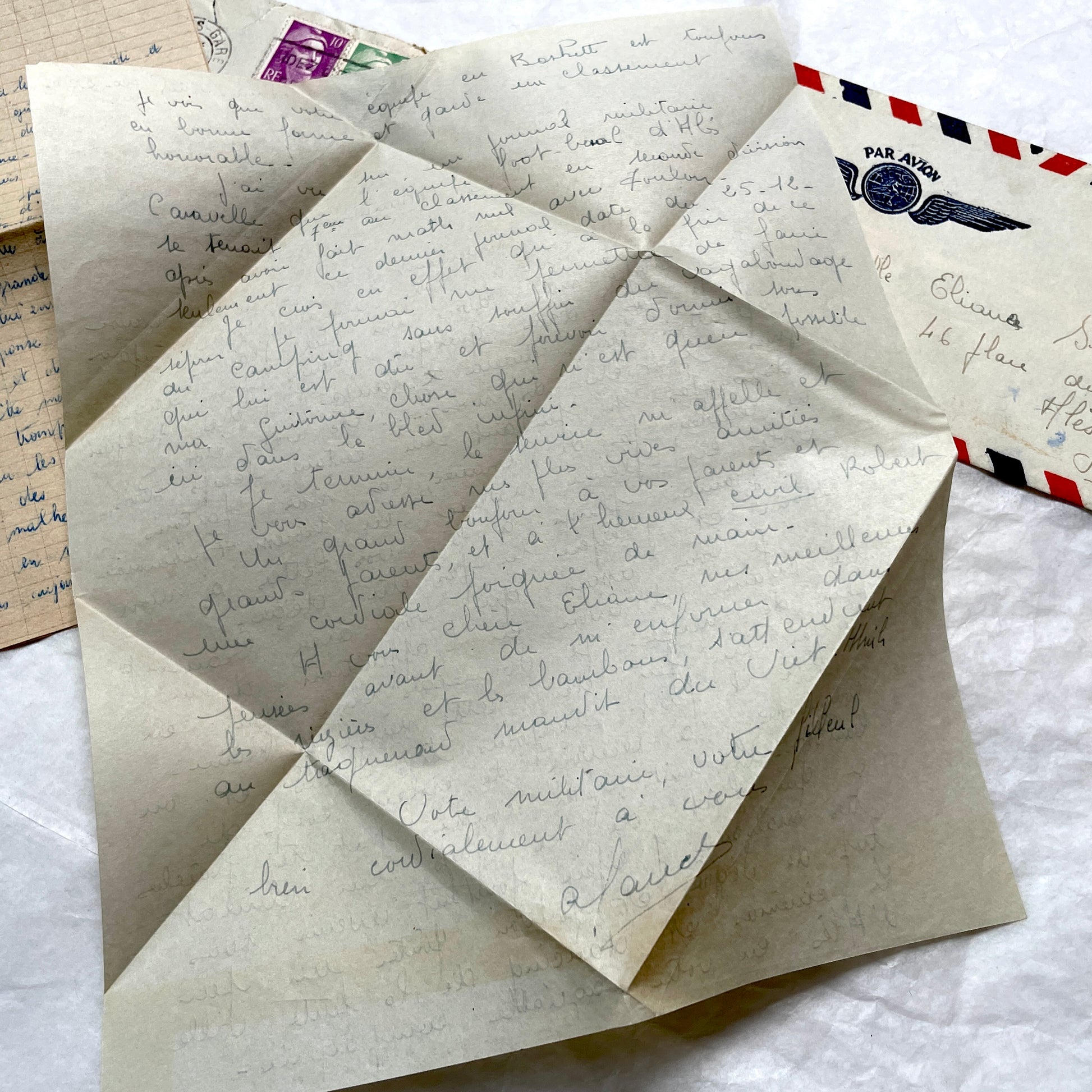 Set of 1940s French letters and envelopes, featuring handwritten notes, postal stamps, and vintage airmail details.