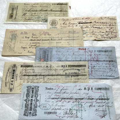 Late 19th Century French bills of exchange set, showing handwritten text, stamps, and commercial letterheads.