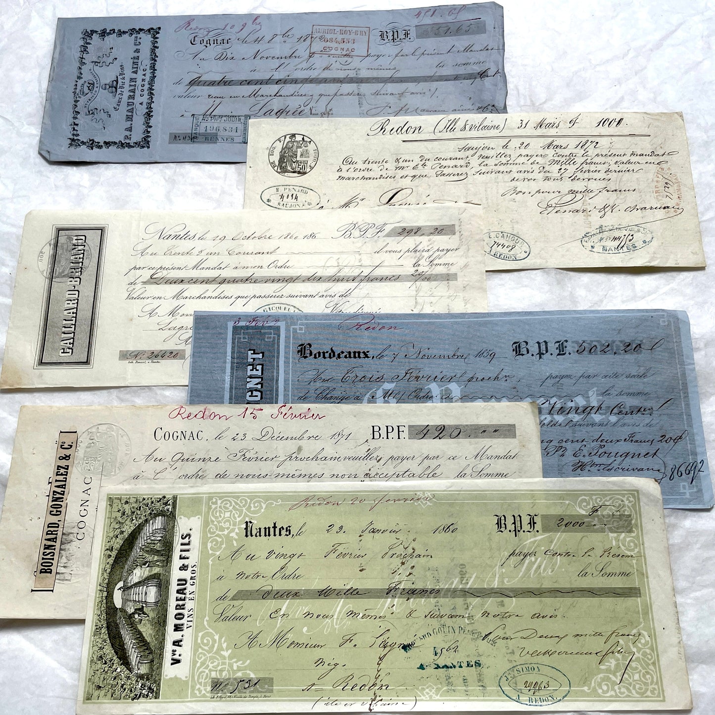 Set of 6 Late 19th Century French letters of exchange, featuring vintage calligraphy, bank, and merchant stamps.