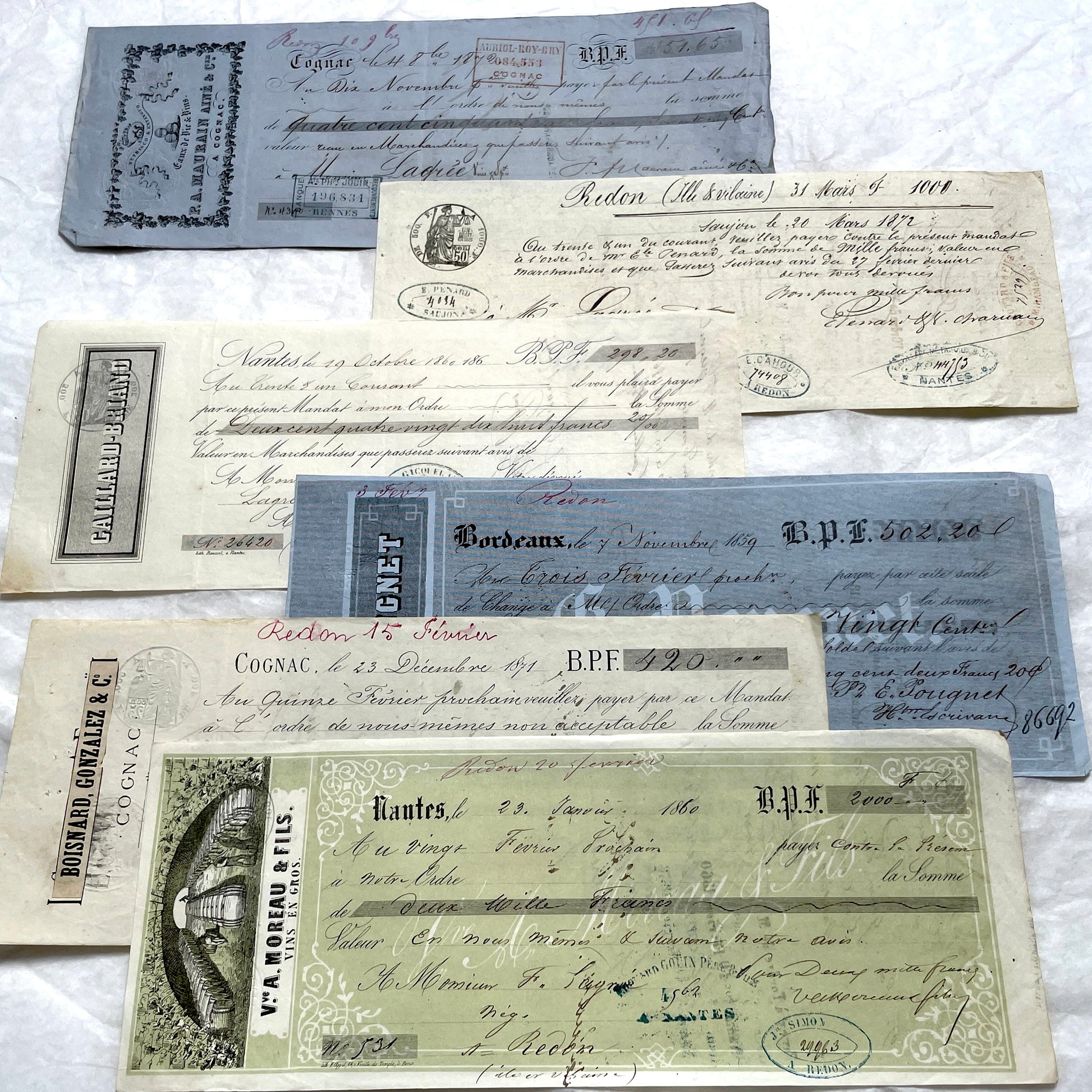 Set of 6 Late 19th Century French letters of exchange, featuring vintage calligraphy, bank, and merchant stamps.