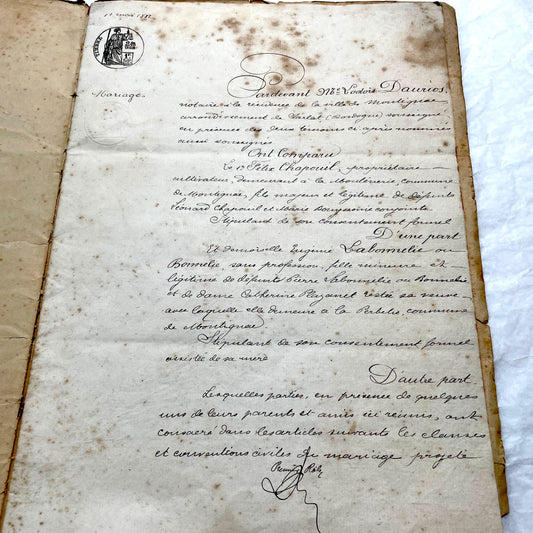 Late 19th Century French notarial marriage contract document from 1882, featuring ornate handwritten script and an official s