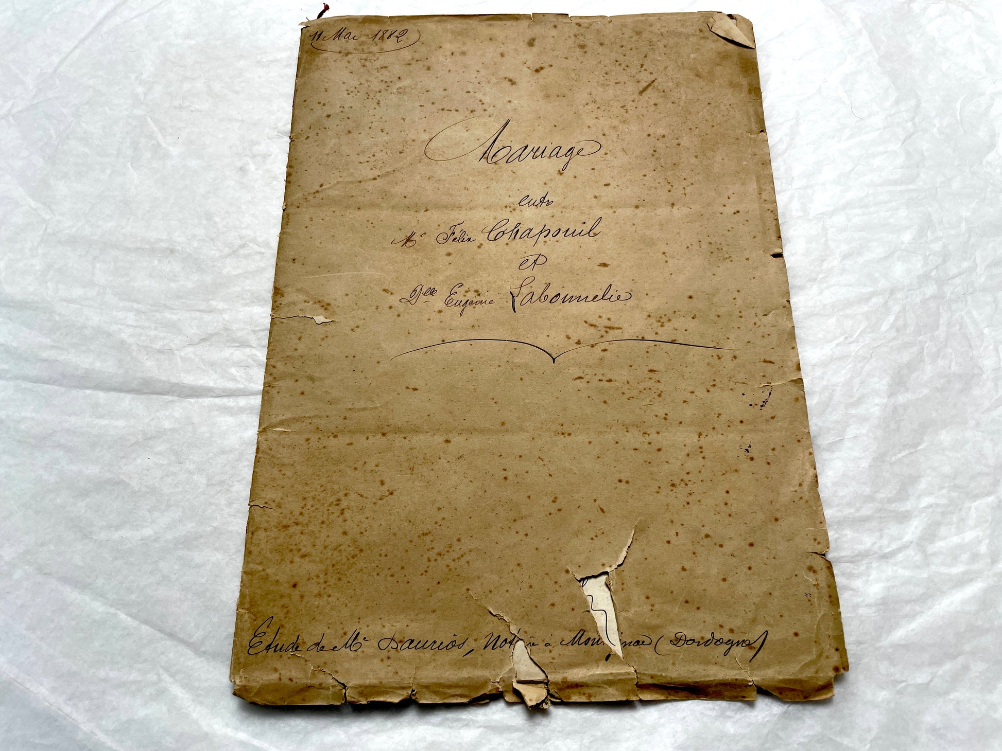 Late 19th Century French notarial marriage contract document from 1882, featuring ornate handwritten script and an official s