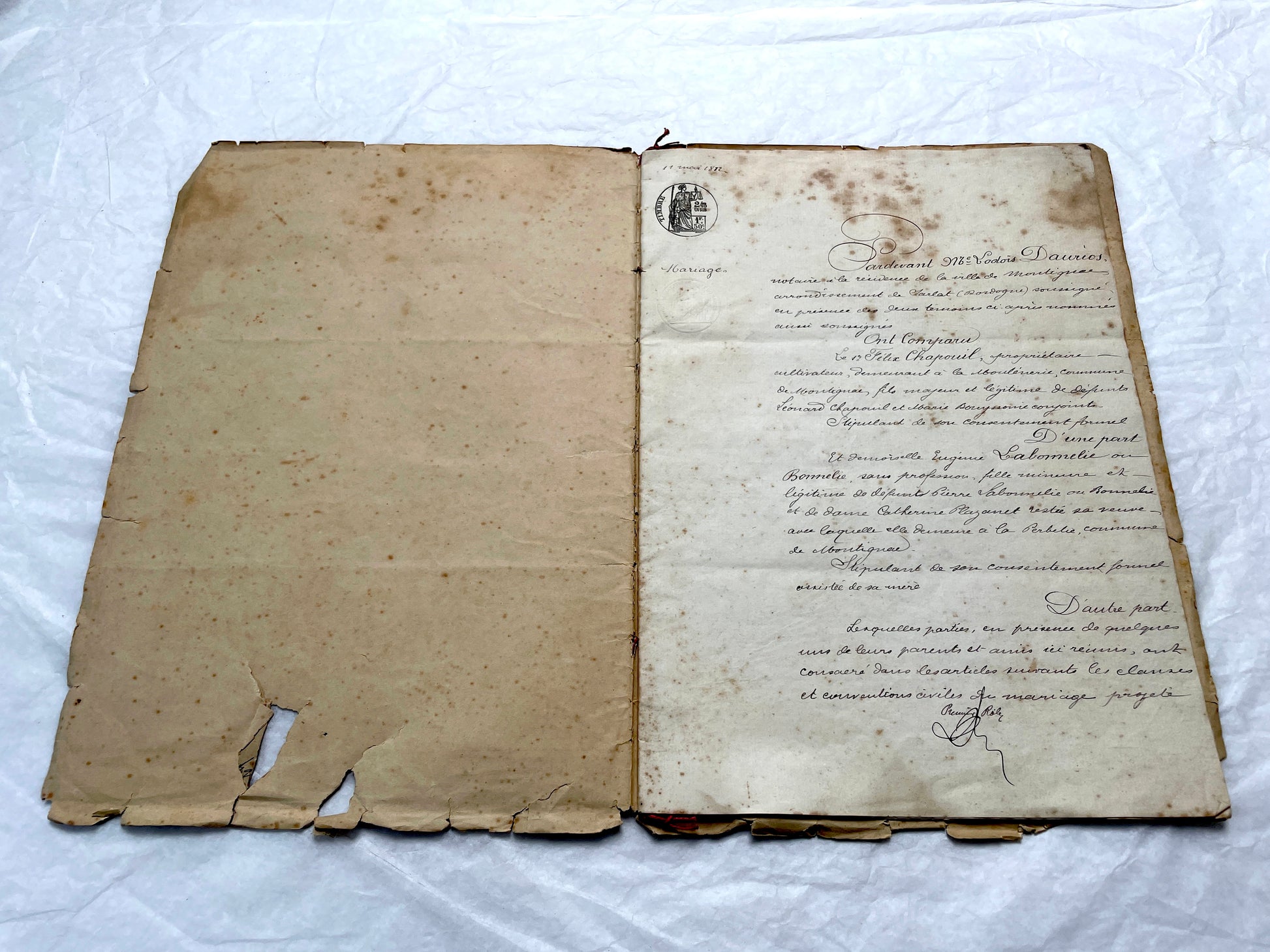 Late 19th Century French notarial marriage contract document from 1882, featuring ornate handwritten script and an official s