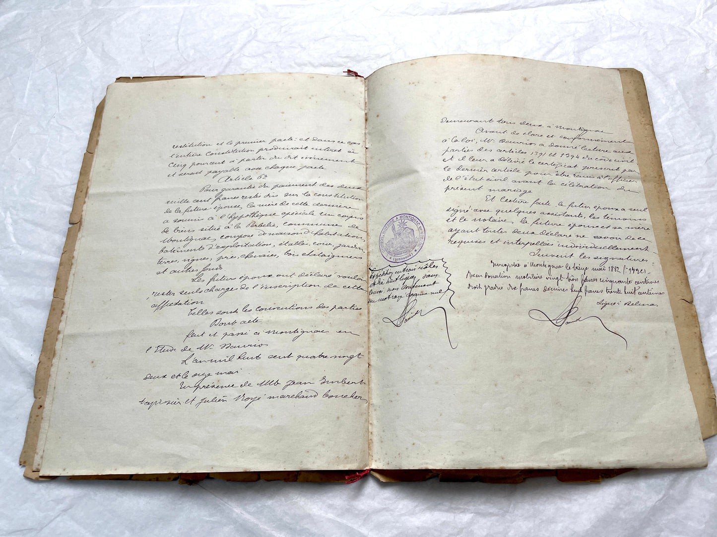 Late 19th Century French notarial marriage contract document from 1882, featuring ornate handwritten script and an official s