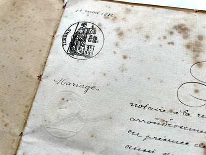 Late 19th Century French notarial marriage contract document from 1882, featuring ornate handwritten script and an official s