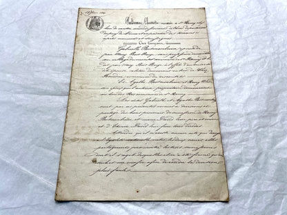 Mid 19th Century French Notarial Act from 1856 with elegant handwritten text and clear imperial stamp.