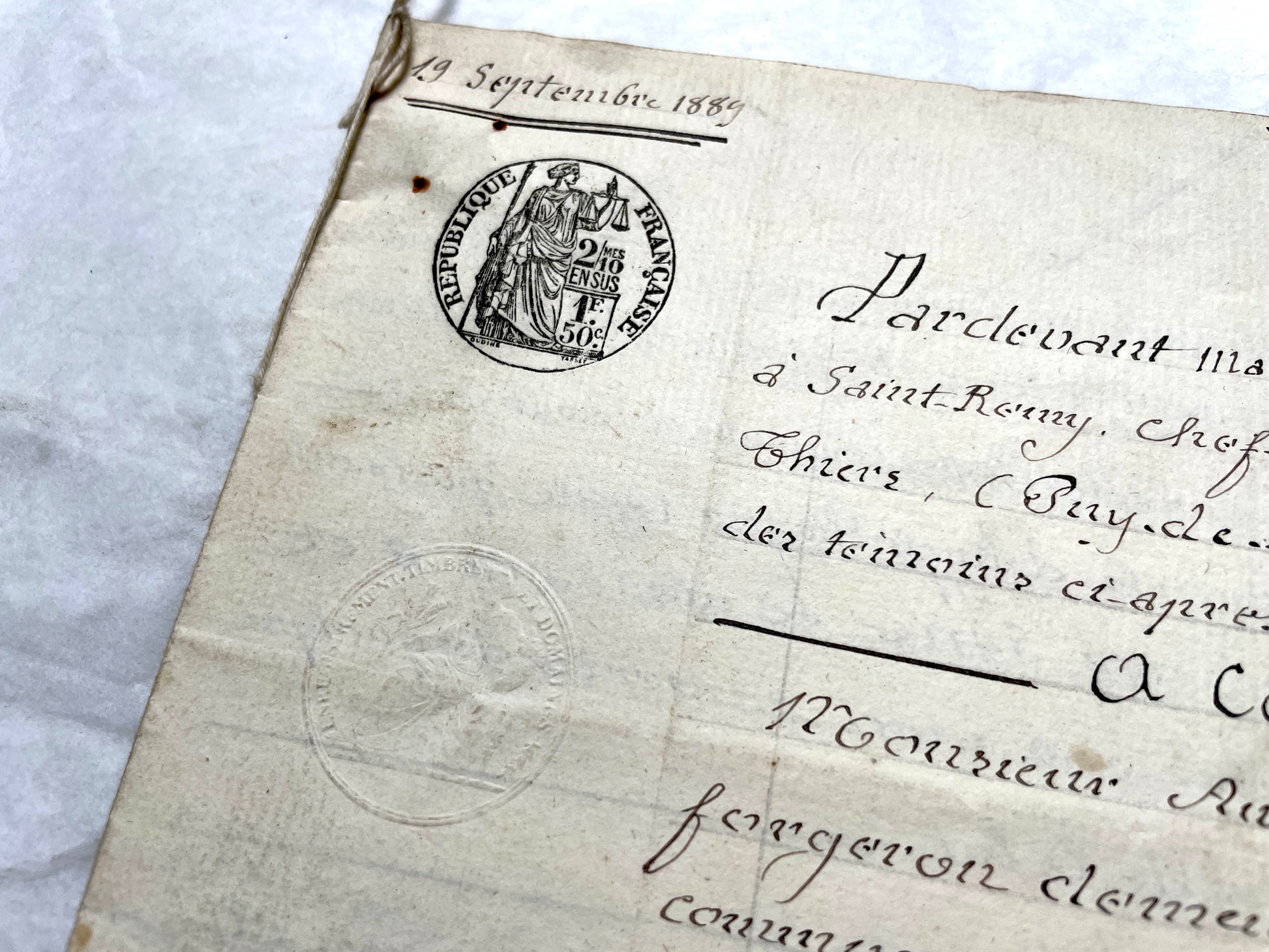 Late 19th century French notarial act from 1889, a handwritten legal document with Republic stamp and elegant script.